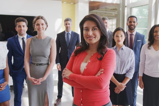 portrait-of-multi-cultural-business-team-standing-2024-10-19-13-01-29-utc