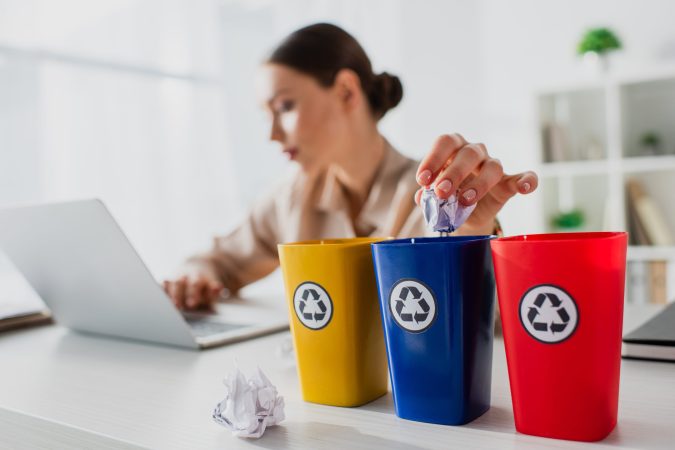 selective-focus-of-businesswoman-throwing-crumpled-2024-11-17-19-40-39-utc